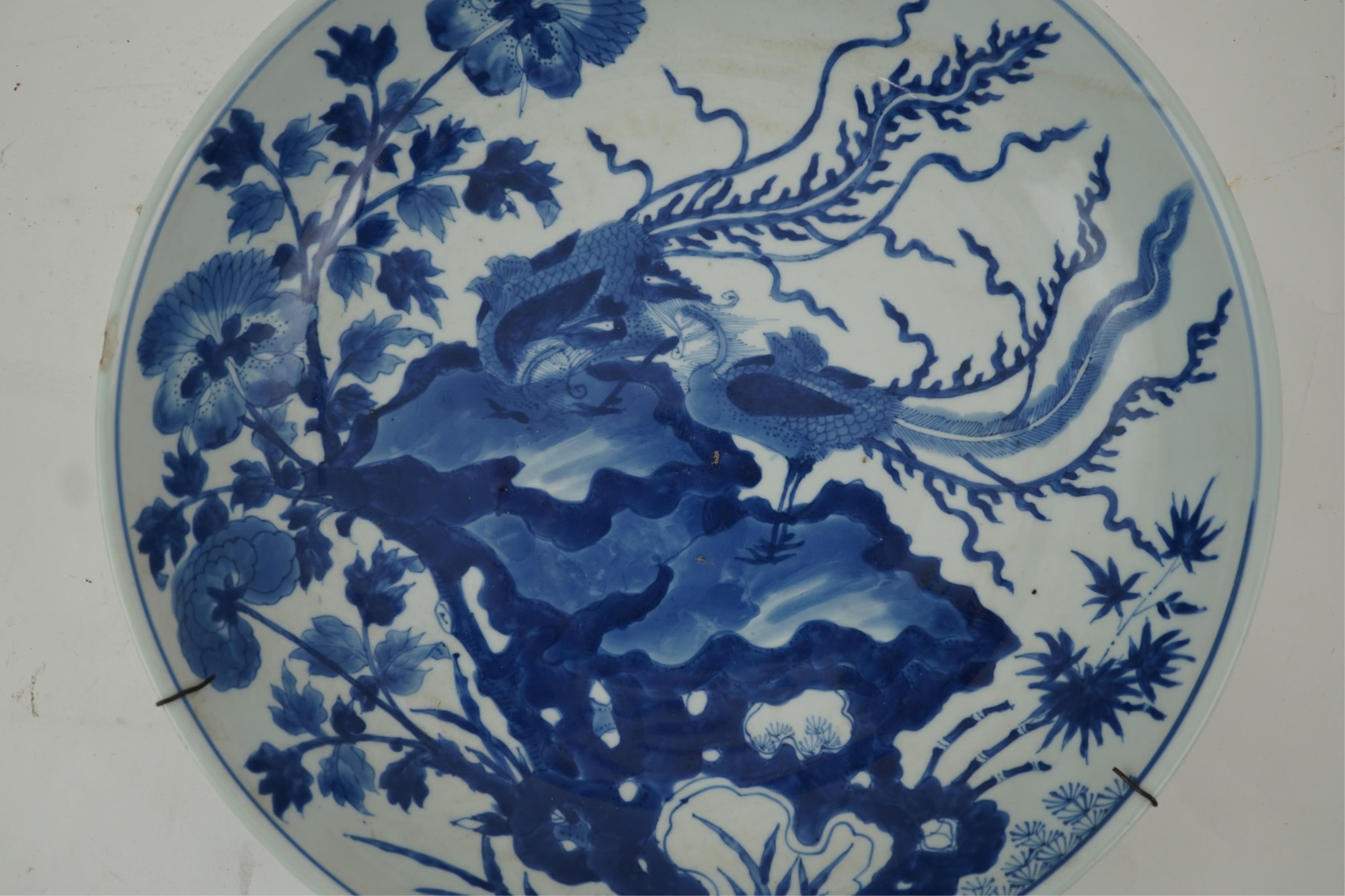 A Chinese blue and white ‘double phoenix’ dish, Kangxi period